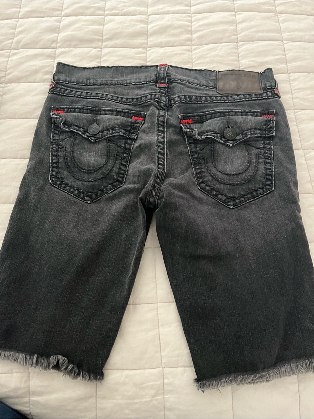 True Religion Men’s Black Denim Cutoff Shorts with flaw